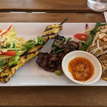 Taste With Andy - a plate of food on a table - Thai Near Me - Guelph, Ontario Taste With Andy - a plate of food on a table - Thai Near Me - Guelph, Ontario