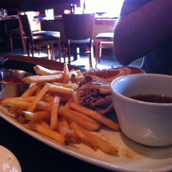 Baxters American Grille - French dip with au jus sauce - New American Near Me - Bloomington, Illinois Baxters American Grille - French dip with au jus sauce - New American Near Me - Bloomington, Illinois