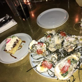 Eberly - Crab cornbread (phenomenal) and pork belly oysters (not worth the price) - Bars Near Me - Austin, Texas Eberly - Crab cornbread (phenomenal) and pork belly oysters (not worth the price) - Bars Near Me - Austin, Texas
