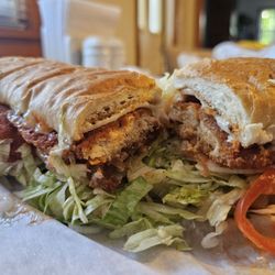 Chicken finger sub. Hot with cheese, lettuce, tomato, onion, mayo and bleu cheese. Fucking KILLER!