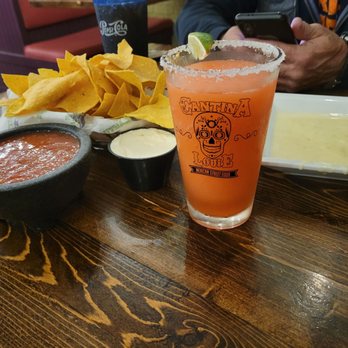 Cantina Louie - Peach strawberry margarita Louie Cheese dip soir cream chips and salsa - Mexican Near Me - St. Augustine, Florida