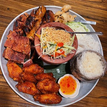 Bhan Mae Vane - Papaya platter w/ spicy wings, lao sausages, & crispy pork belly - Thai Near Me - Alameda, California Bhan Mae Vane - Papaya platter w/ spicy wings, lao sausages, & crispy pork belly - Thai Near Me - Alameda, California