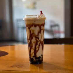 Heavenly Asian Cuisine & Lounge - Creme Brulé milk tea with tapioca boba pearls- for adults there is an option to add a shot of your favorite liquor.
