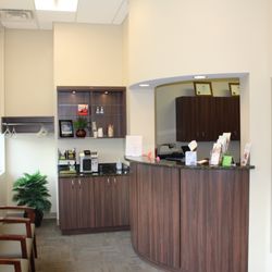 Smile Exchange of Springfield - Waiting Area (desk & coffee area)