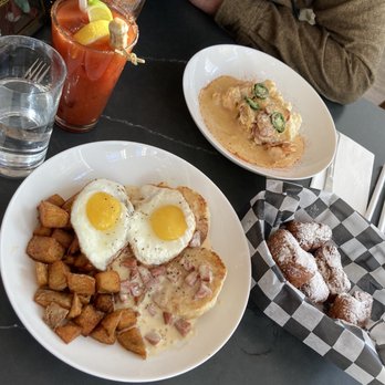Wilma's - Beignets, andouille sausage gravy and shrimp & grits. - Seafood Near Me - Wilmington, Delaware Wilma's - Beignets, andouille sausage gravy and shrimp & grits. - Seafood Near Me - Wilmington, Delaware