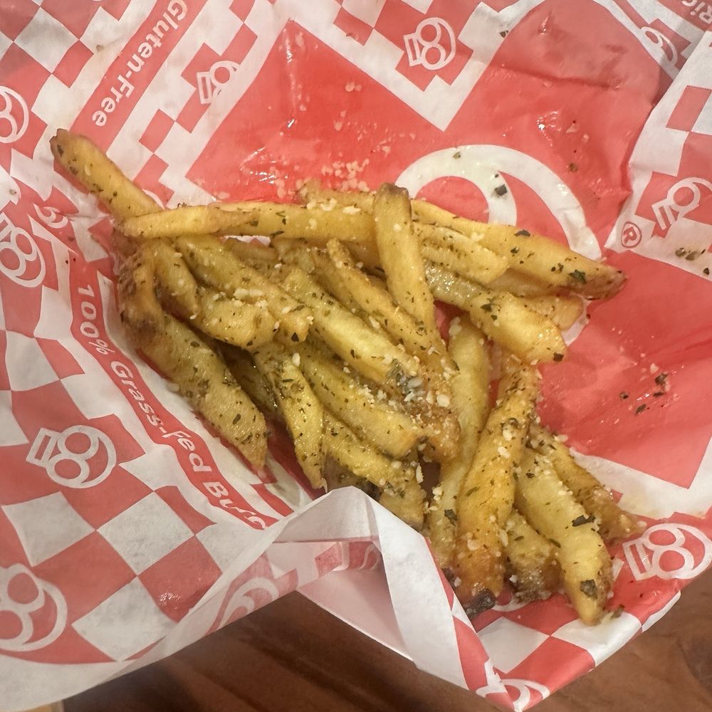 Toxic Burger - Garlic parm - half eaten - Burgers Near Me - Creswell, Oregon Toxic Burger - Garlic parm - half eaten - Burgers Near Me - Creswell, Oregon