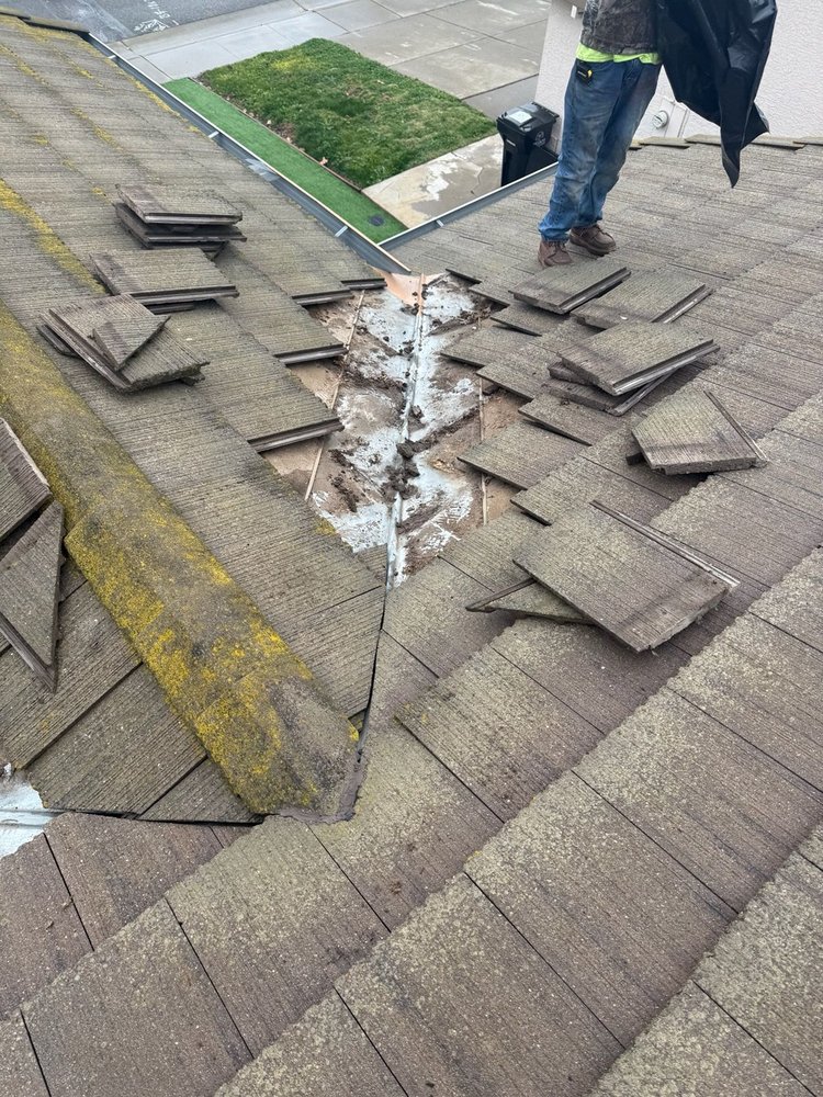 Slide of Maginis Roofing