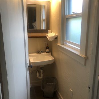 River Rock Inn - Bathroom ( toilet and shower behind door) only room for one person at a time - Hotels Near Me - Mariposa, California
