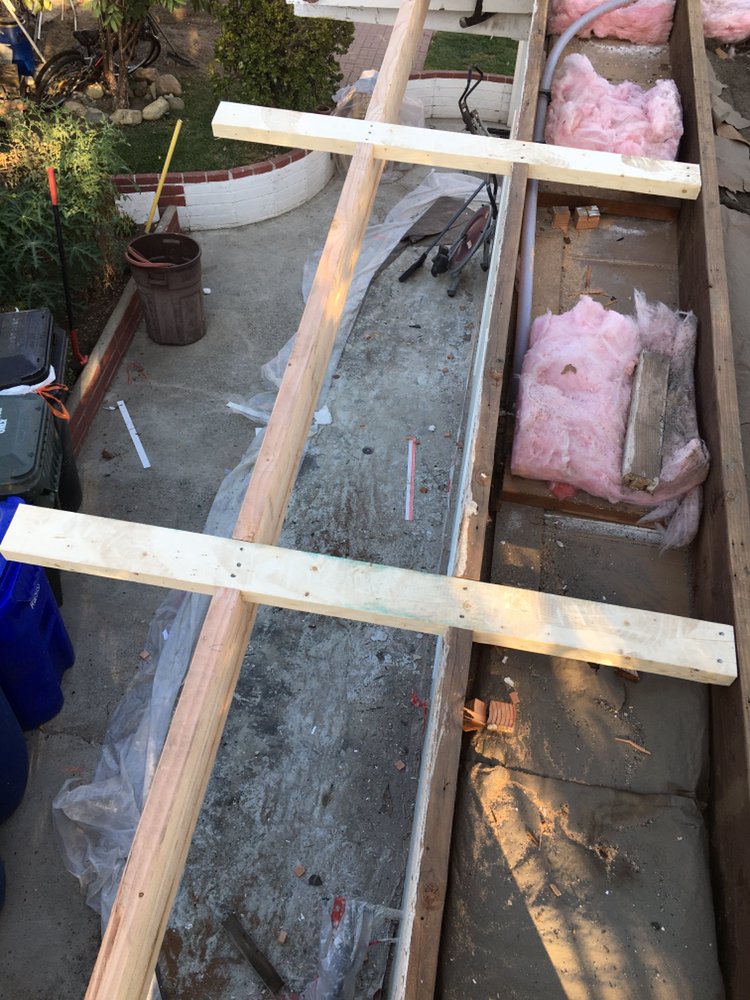 Slide of Lopez Roofing