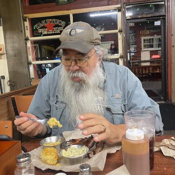 Southbay Dickerson's BBQ - My husband guarding his delicious rib plate and sides from me... the couple bites I may have tried were delicious. - Barbeque Near Me - Olympia, Washington Southbay Dickerson's BBQ - My husband guarding his delicious rib plate and sides from me... the couple bites I may have tried were delicious. - Barbeque Near Me - Olympia, Washington