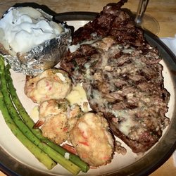 Brass Tack Restaurant - $24.95 for a 12oz Delmonico, Stuffed Shrinp Ala Oscar, Grilled Asparagus & 2 Sides {Salad not Pictured}.