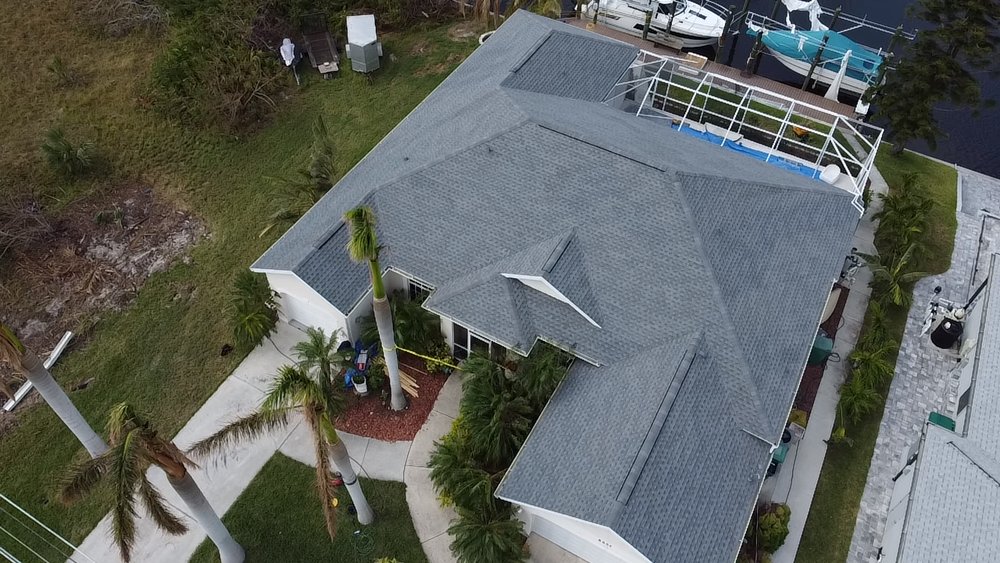 Slide of D’ Roofing Group