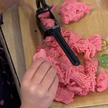Broadway Children's School - Play dough is great for building fine motor muscles and can be used in so many ways! Here is some garlic press pink play dough spaghetti. - Preschools Near Me - Oakland, California