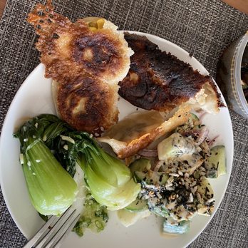 Ernest - Dumplings(meat, seafood, veg), bak choy, cucumber salad. - New American Near Me - San Francisco, California