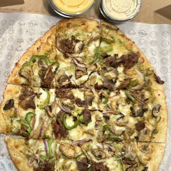 Azzip Pizza - Funky Chicken: Big Zip, Pesto, Garlic Butter, Mozzarella, Chicken, Pork, Mushrooms, Green Peppers, Red Onions, Ranch, Hot Honey, Cheese - Pizza Near Me - Indianapolis, Indiana