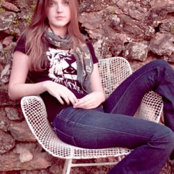 Satisfactory Design & Printing - Lion discharge print on 100% cotton black shirt.