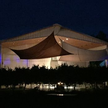 Beaumont Cellars - the exterior of a building lit up at night - Wineries Near Me - Quincy, Washington Beaumont Cellars - the exterior of a building lit up at night - Wineries Near Me - Quincy, Washington