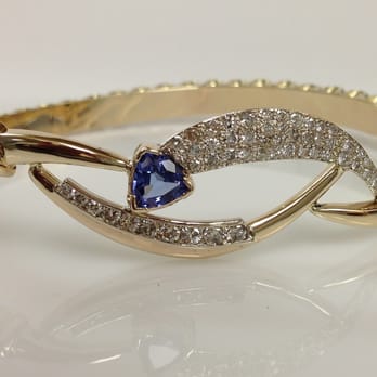 Ginis Goldsmiths - Ladies two-tone diamond & Tanzanite bangle bracelet Ginis Goldsmiths, Midland, MI - Jewelry Near Me - Midland, Michigan Ginis Goldsmiths - Ladies two-tone diamond & Tanzanite bangle bracelet Ginis Goldsmiths, Midland, MI - Jewelry Near Me - Midland, Michigan