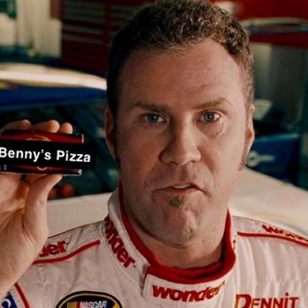 Benny's Pizza - a man holding a pizza box - A man wearing a racing suit with various sponsor patches holds a matchbox labeled "Benny's Pizza" close to his face. The background appears to be a garage or workshop with tools and equipment visible. The image is a still from a film or television scene. - Pizza Near Me - Milan, Illinois
