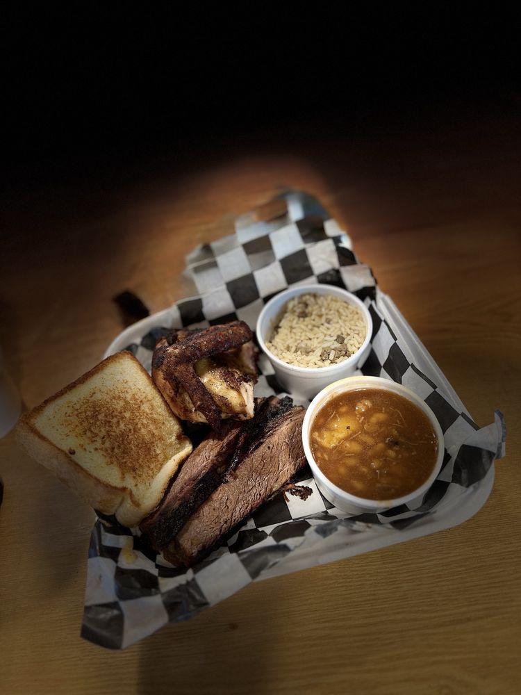 Smokin' J's A Barbeque Joint Logo