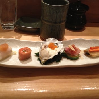 Nishino - 1st course: monk fish liver, salmon, oyster, kampachi (?), fried smelt - Sushi Bars Near Me - Seattle, Washington