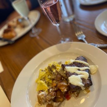 Teddy & The Bully Bar - a plate of food and a glass of wine - New American Near Me - Washington, DC, District of Columbia Teddy & The Bully Bar - a plate of food and a glass of wine - New American Near Me - Washington, DC, District of Columbia