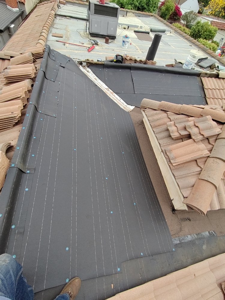 Slide of NRG Roofing