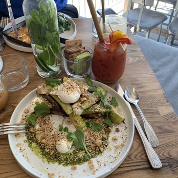 Bruce & Son - Summer squash, poached egg, and salsa verde with a Bloody Mary - American Near Me - Greenport, New York Bruce & Son - Summer squash, poached egg, and salsa verde with a Bloody Mary - American Near Me - Greenport, New York