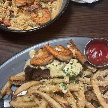 Burtons Grill & Bar - Steak Frites add shrimp and Cajun Shrimp Pasta no red peppers - New American Near Me - Richmond, Virginia