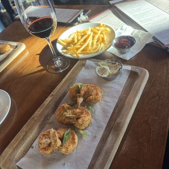 Paul Martin's American Grill - L Golden Fried Shrimp and French fries with a glass of Cabernet - New American Near Me - El Segundo, California Paul Martin's American Grill - L Golden Fried Shrimp and French fries with a glass of Cabernet - New American Near Me - El Segundo, California