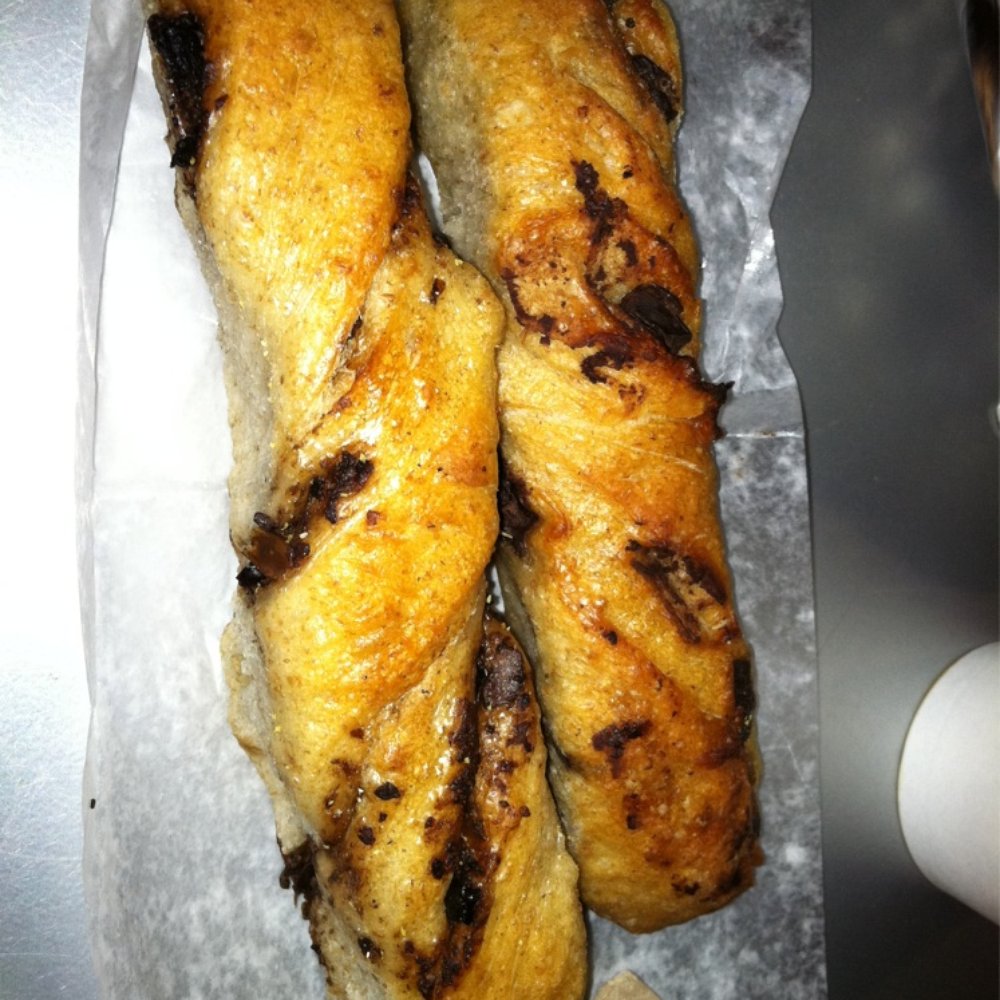 Amy's Bread - An olive twist and a chocolate chip sourdough twist. Which is which? :) - Bakeries Near Me - New York, New York