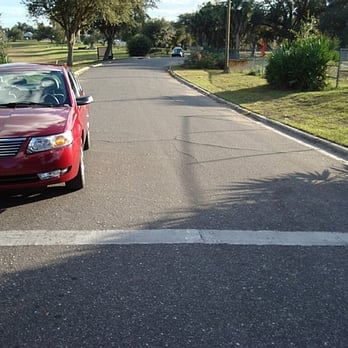 Spook Hill - STOP CAR ON WHITE LINE, PLACE IN NEUTRAL, AND LET IT ROLL BACK. (I moved it up after taking this photo) - Landmarks & Historical Buildings Near Me - Lake Wales, Florida Spook Hill - STOP CAR ON WHITE LINE, PLACE IN NEUTRAL, AND LET IT ROLL BACK. (I moved it up after taking this photo) - Landmarks & Historical Buildings Near Me - Lake Wales, Florida