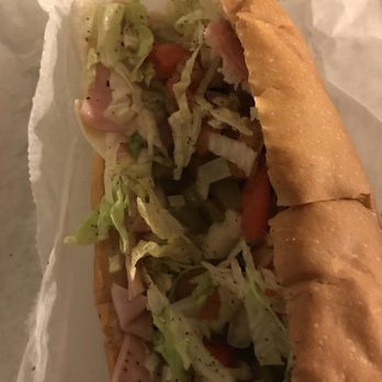 LP Pizza & Subs - a sub sandwich with lettuce and tomatoes - Pizza Near Me - Somerville, Massachusetts LP Pizza & Subs - a sub sandwich with lettuce and tomatoes - Pizza Near Me - Somerville, Massachusetts