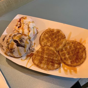 Yorica! - Two ice creams (Gooey Vanilla Cookie and Cookies & Cream) and waffles, with caramel syrup on top. - Ice Cream & Frozen Yogurt Near Me - London, XGL
