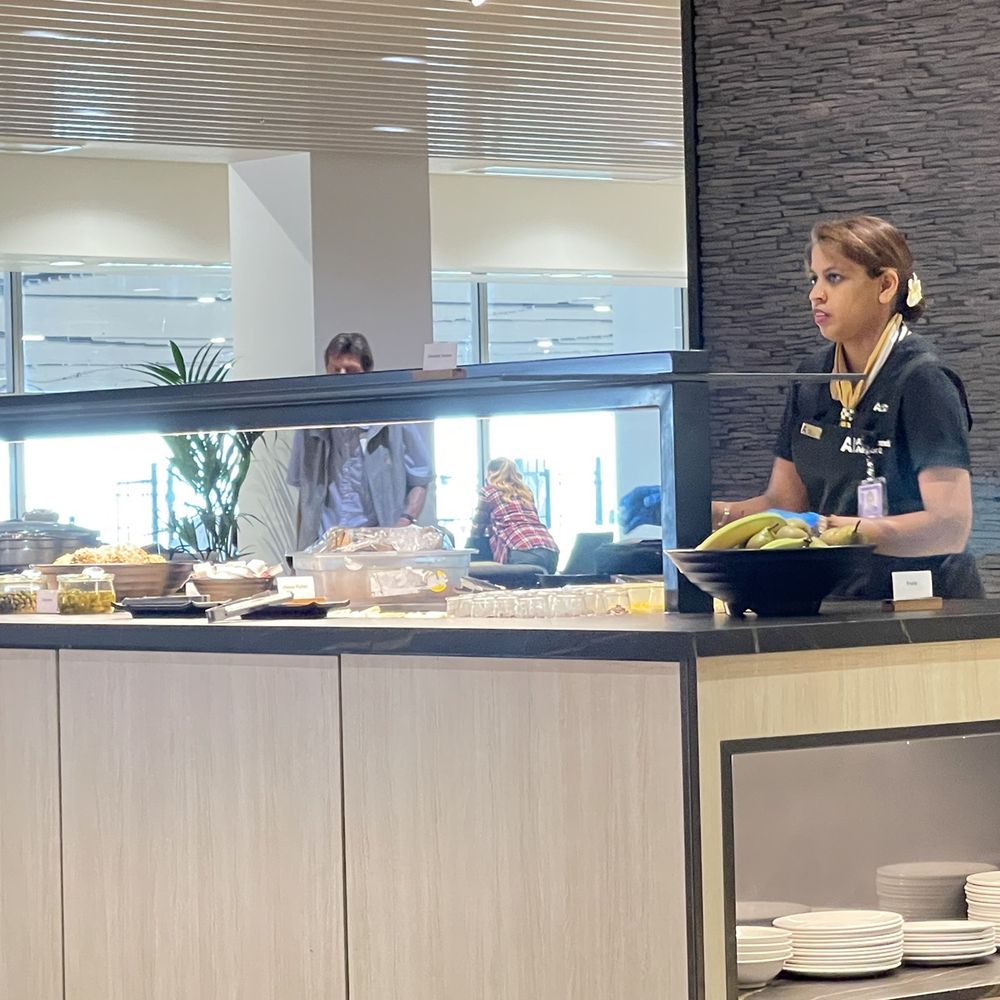 Strata Lounge - Refilling the dessert station - Airport Lounges Near Me - Auckland, AUK