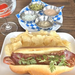 Mini dirty dog Martini and beef hot dog on happy hour menu Mini dirty dog Martini and beef hot dog on happy hour menu
