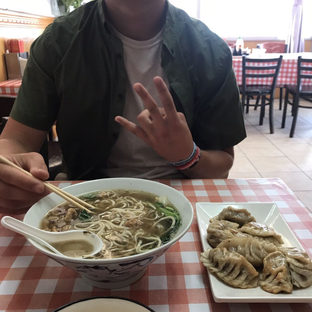 Hand Pull Noodle and Dumpling House - My son enjoying chicken noodles and fried dumplings - Chinese Near Me - Brooklyn, New York Hand Pull Noodle and Dumpling House - My son enjoying chicken noodles and fried dumplings - Chinese Near Me - Brooklyn, New York