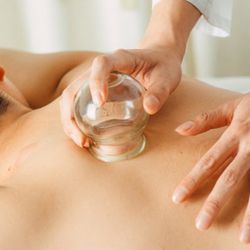 KD Acupuncture Therapy - Cupping therapy reduces muscle tension and pain.