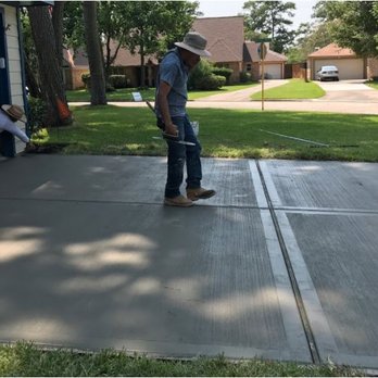 Southern Care Sweeping & Paving - a man standing on a driveway - General Contractors Near Me - Spring, Texas Southern Care Sweeping & Paving - a man standing on a driveway - General Contractors Near Me - Spring, Texas