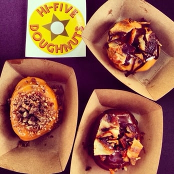 Hi-Five Doughnuts - From top right: chocolate and bourbon caramel glaze with bacon, chocolate glaze with bacon and bourbon caramel glaze with pecans - Donuts Near Me - Louisville, Kentucky Hi-Five Doughnuts - From top right: chocolate and bourbon caramel glaze with bacon, chocolate glaze with bacon and bourbon caramel glaze with pecans - Donuts Near Me - Louisville, Kentucky