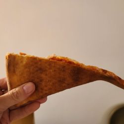 Treviso Pizza & Grill - slice of cheese pizza