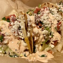 Old Neighborhood Pub - Carryout of the Mexican Monday special: 4 pork belly tacos for $9.
