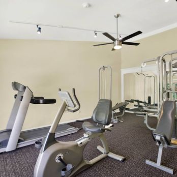 Casa De Oro Apartments - a gym with various exercise equipment on the floor - Apartments Near Me - Torrance, California Casa De Oro Apartments - a gym with various exercise equipment on the floor - Apartments Near Me - Torrance, California
