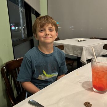 Il Dolce Pizzeria & Restaurant - My happy kiddo- with his Shirley temple they made for him with extra cherries - Italian Near Me - Costa Mesa, California Il Dolce Pizzeria & Restaurant - My happy kiddo- with his Shirley temple they made for him with extra cherries - Italian Near Me - Costa Mesa, California