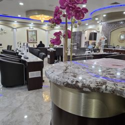 Nails Elegance - Near the entrance by the register.