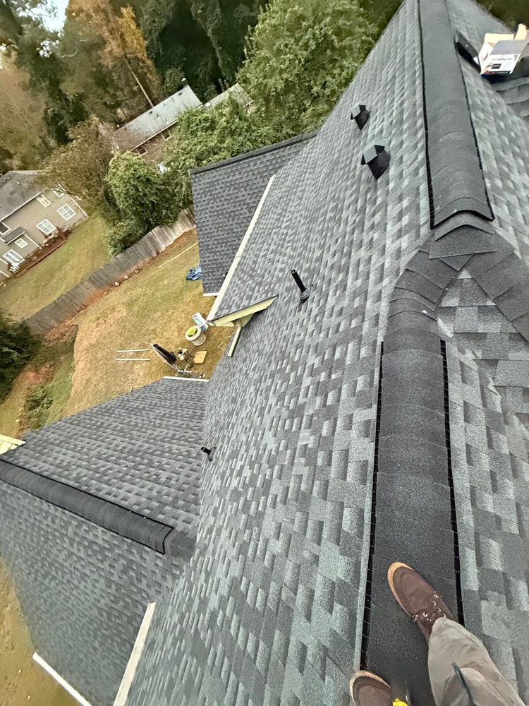 Slide of Umana Roofing