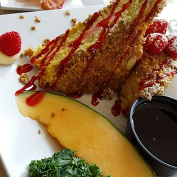 Eggs-Cetera Cafe - Their Signature Stuffed Red Raspberry Granola French Toast. - American Near Me - Lake Worth, Florida Eggs-Cetera Cafe - Their Signature Stuffed Red Raspberry Granola French Toast. - American Near Me - Lake Worth, Florida