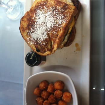 26 Beach Restaurant - "the 19" aka: a fatty's dream. Sausage, egg and cheese stuffed into challah bread French toast with sweet potato tots. Mmm! - New American Near Me - Venice, California