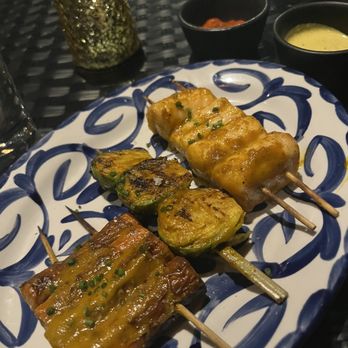 Causa Amazonia - Carrot, brussel sprout, and salmon belly skewers - Tapas/Small Plates Near Me - Washington, DC, District of Columbia Causa Amazonia - Carrot, brussel sprout, and salmon belly skewers - Tapas/Small Plates Near Me - Washington, DC, District of Columbia