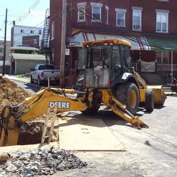 KeptCo Plumbing - a backhoe on a construction vehicle - Plumbing Near Me - Pittsburgh, Pennsylvania